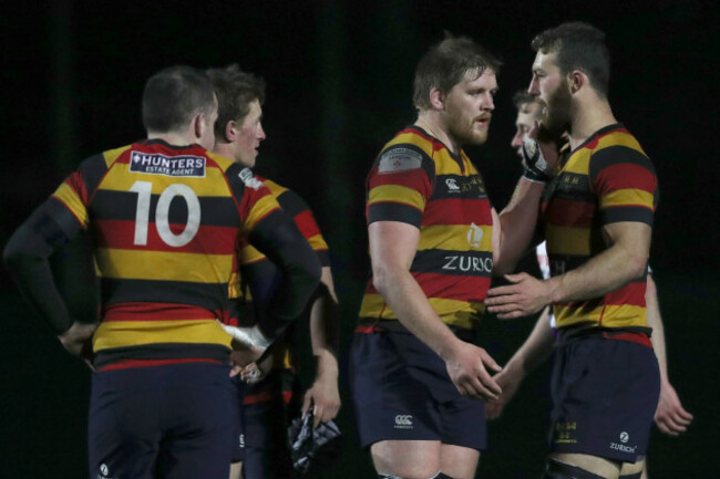 Scott Deasy, Willie Earle and Charlie Butterworth celebrate after the game