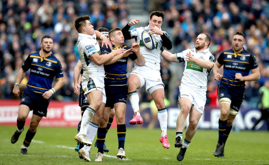 Jordan Larmour with Huw Jones and Lee Jones