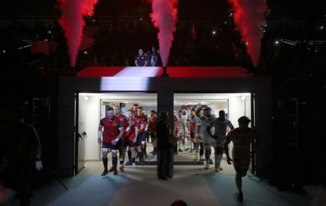 Munster and Racing make their way out onto the pitch