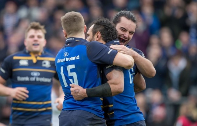 James Lowe and Jordan Larmour celebrate with try scorer Isa Nacewa