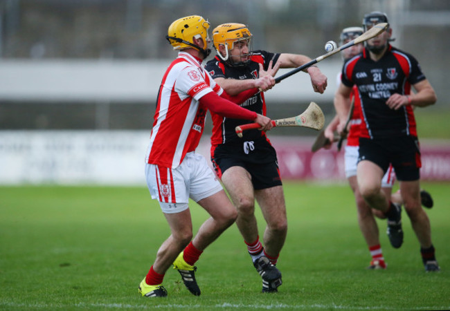 Cian Waldron tackles David Redmond