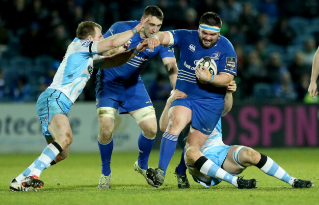 Chris Fusaro and Rob Harley tackle Marty Moore