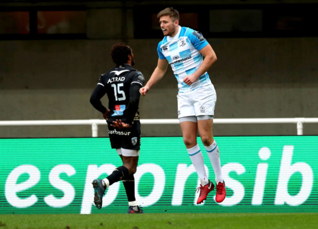 Ross Byrne celebrates scoring the opening try