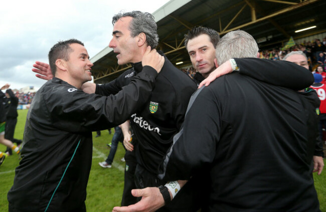 Maxi Curran and Jim McGuinness celebrate