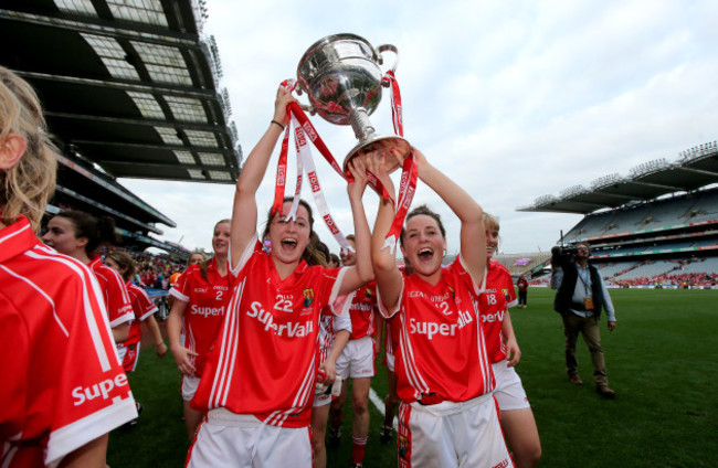 Eimear Scally and Orlagh Farmer celebrate with The Brendan Martin Cup