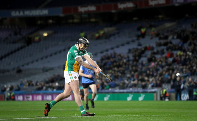 Shane Dooley scores his side's first goal with a penalty