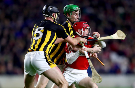 Conor O'Shea and Joey Holden tackle Daniel Kearney