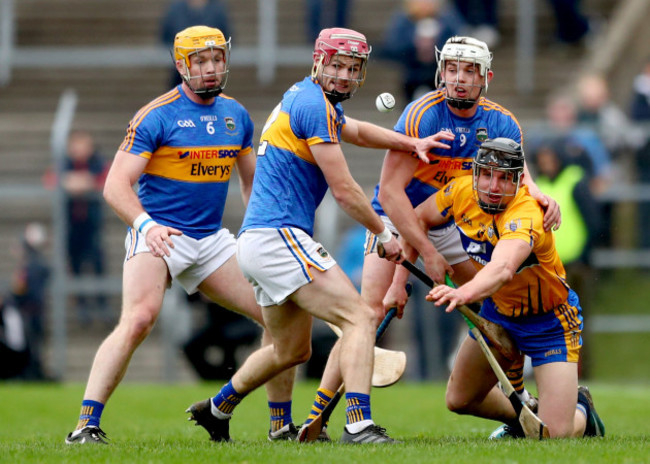 Padraic Maher, Alan Flynn and Ronan Maher with John Conlon