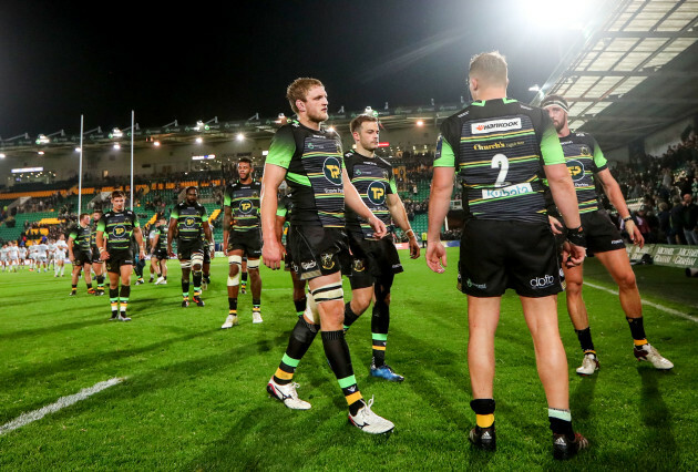 Jamie Gibson and Stephen Myler dejected after the game