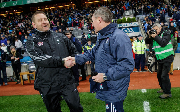 Cian O'Neill and Jim Gavin shake hands after the game