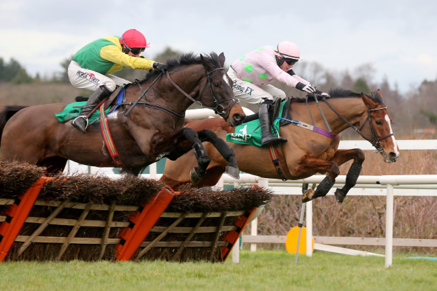 Robbie Power on Supasundae with Paul Townend on Faugheen going over the final fence