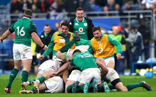 Ireland players celebrate with Johnny Sexton after he kicked the winning drop goal