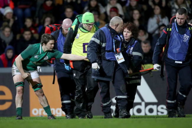 Ciara Griffin checks on Ciara Cooney as she is stretchered off