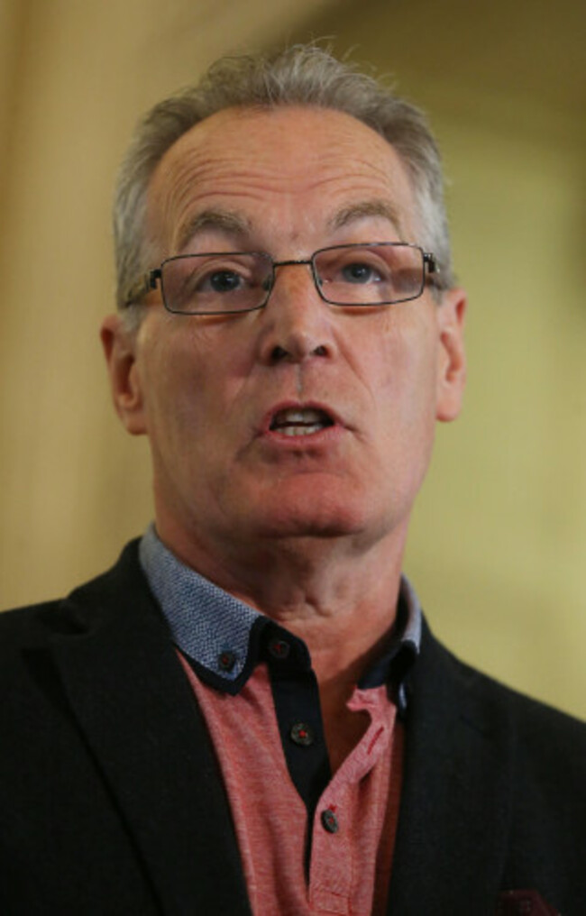 Gerry Kelly removes clamp from car