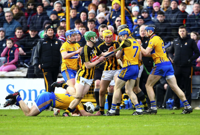 Both sets of players come together on the halfway line