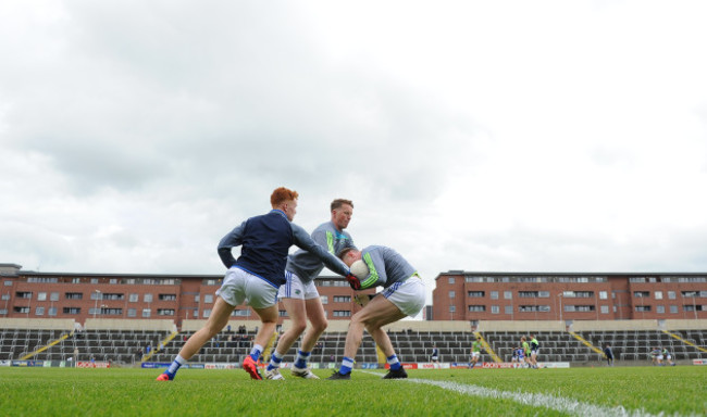 Laois players warm up before the game