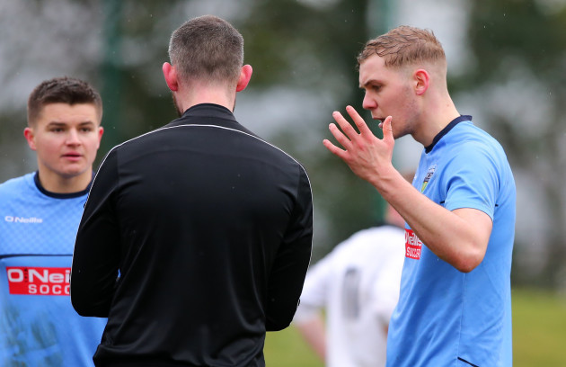 Georgie Kelly appeals to the referee after receiving  a red card