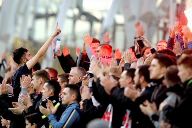 Dundalk fans applaud in the 29th minute in memory of Robert McLoughlin