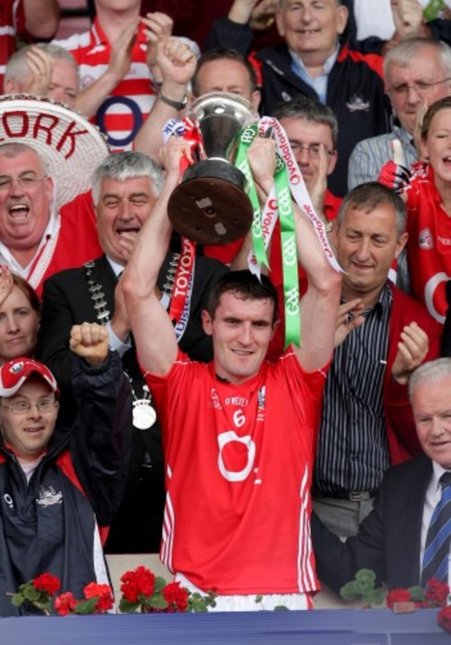 Captain Graham Canty raises the Munster Senior Football trophy