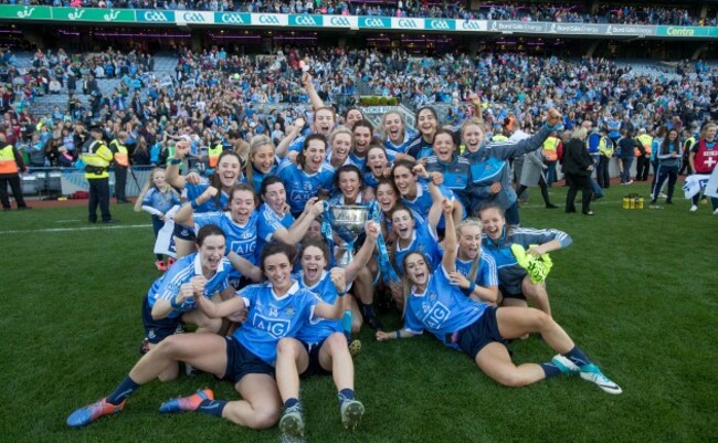 Dublin players celebrates with the Brendan Martin Cup