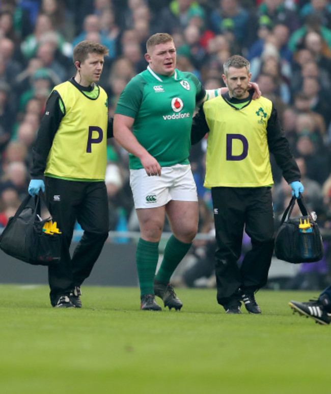 Tadhg Furlong leaves the field with an injury