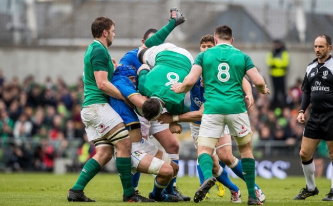 Peter O'Mahony is lifted off his feet by Simone Ferrari