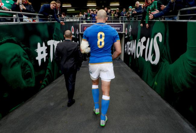 Sergio Parisse leaves the field after the game