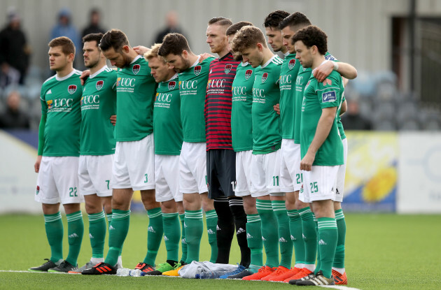 Cork City players stand for a minutes silence in memory of Liam Miller