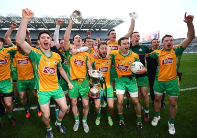 Corofin players celebrate with the cup