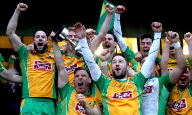 Ciaran McGrath and Micheal Lundy lift the trophy