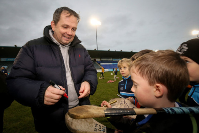 Davy Fitzgerald signs hurleys after the game