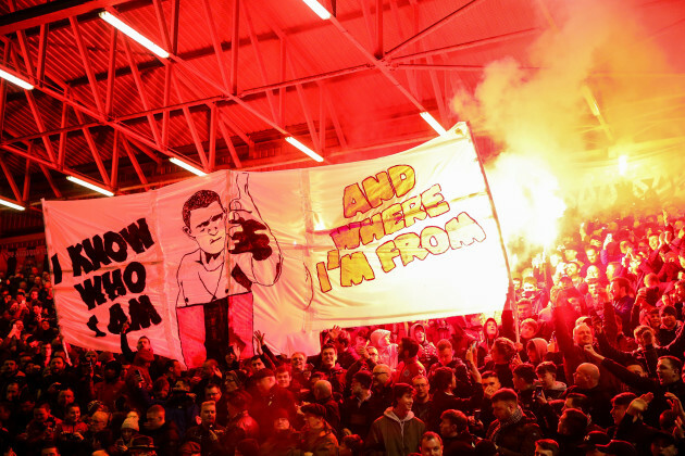 Bohemians fans light flares before the game