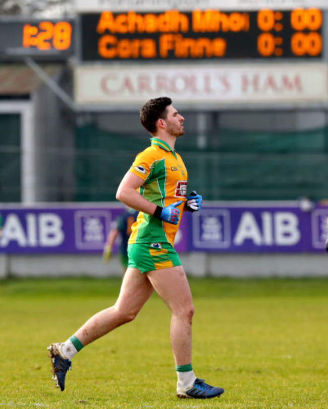 Martin Farragher leaves the field after being red carded in the opening minute