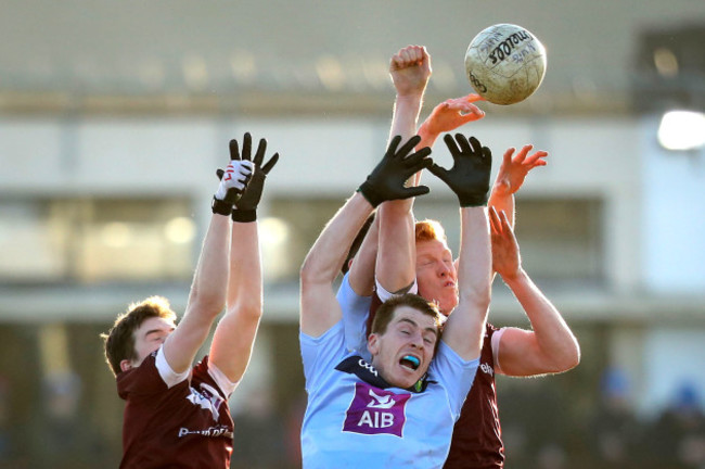 Barry O'Sullivan contests the ball with Cein D'Arcy and Peter Cooke