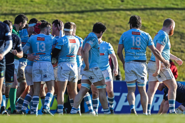 Garryowen players celebrate the last try of the match