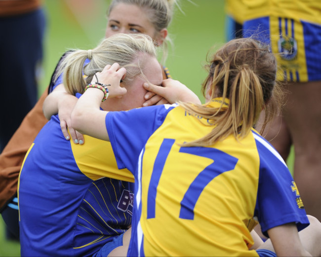 Richael Timothy is consoled by her teammate Sorcha Bruen