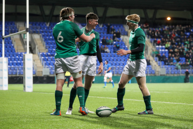 James McCarthy celebrates scoring his side's fourth try with Sean Masterson and Tommy O'Brien