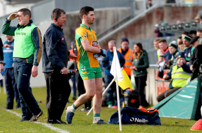 Martin Farragher leaves the field after being red carded in the opening minute