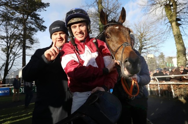 Jack Kennedy onboard Monbeg Notorious celebrates winning with Gordon Elliott