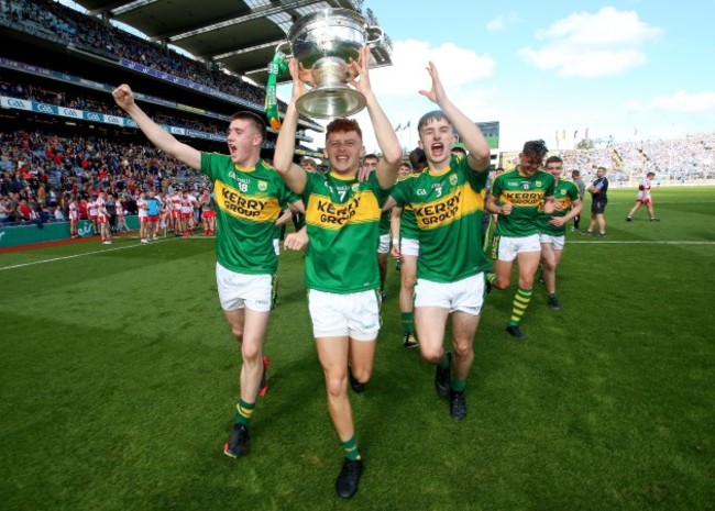 Eddie Horan, Niall Donohue and Chris O’Donoghue celebrate with the trophy