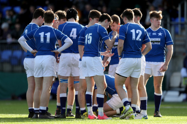 St Mary's College huddle before the game