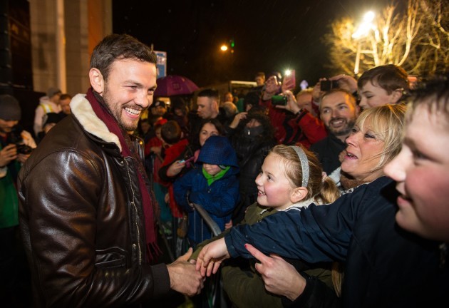 Andy Lee greets supporters
