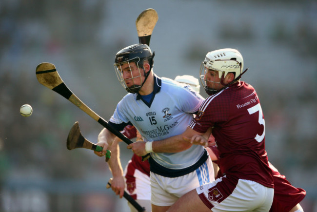 Peter Casey is tackled by Martin Burke