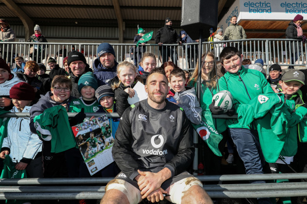 Jack Conan poses for photos with fans