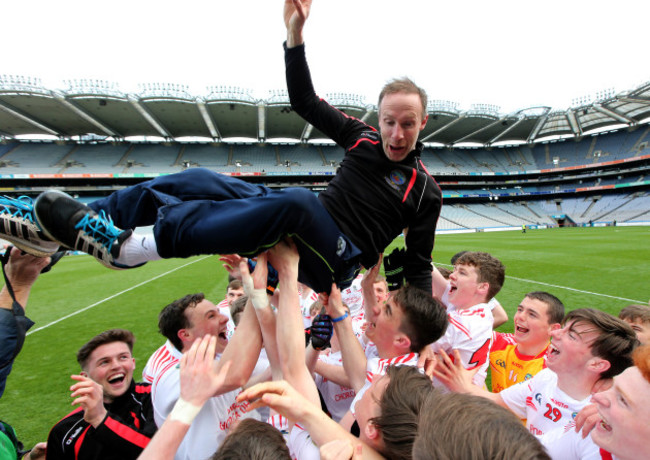 Tommy Griffin celebrates with his team after the game