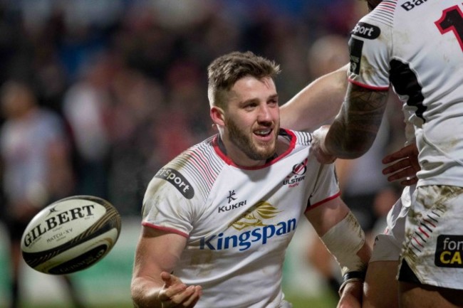 Stuart McCloskey celebrates scoring a try