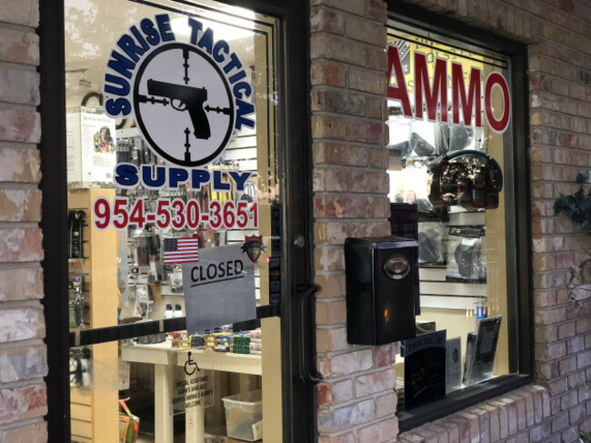 Gun shop owners distraught over selling rifle to 'maniac' who killed 17 at school