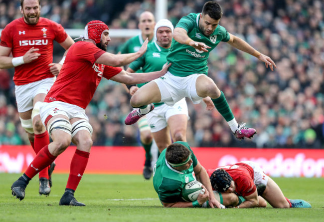 Conor Murray jumps CJ Stander as he's tackled by Leigh Halfpenny