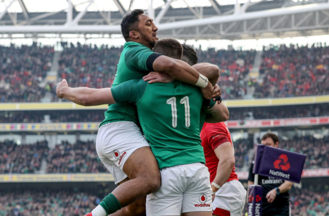 Jacob Stockdale celebrates scoring their first try with Bundee Aki