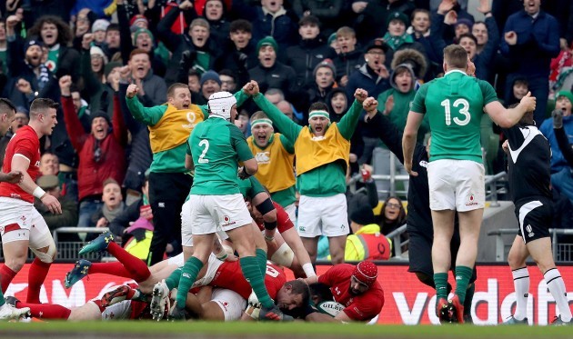 Ireland players celebrate as Bundee Aki scores their second try